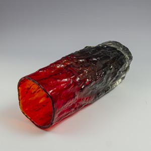 Red glass vase with bark-like texture, unknown mfg.